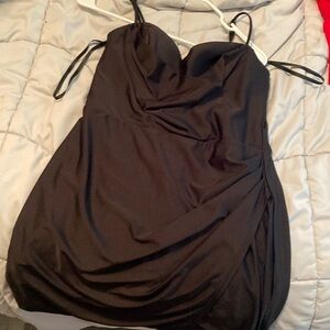 Worn once. Built in bra and zips in the back. Very comfortable